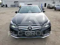 2014 Mercedes Benz E-Class фото