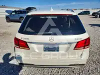 2014 Mercedes Benz E-Class фото