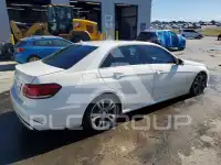 2014 Mercedes Benz E-Class фото