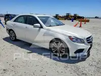2014 Mercedes Benz E-Class фото