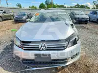 2014 Volkswagen Passat фото
