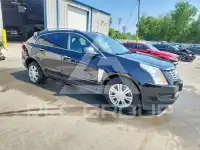 2015 Cadillac SRX фото
