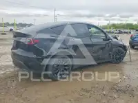 2023 Tesla Model Y фото