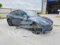 2023 Tesla Model Y фото