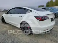 2023 Tesla Model 3 фото