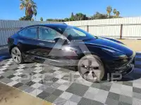 2023 Tesla Model 3 фото