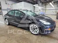 2023 Tesla Model 3 фото