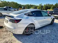 2023 Tesla Model 3 фото