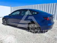 2023 Tesla Model 3 фото