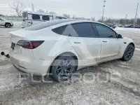 2023 Tesla Model 3 фото
