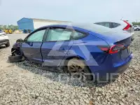 2023 Tesla Model 3 фото