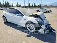 2023 Tesla Model 3 фото