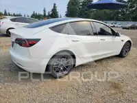 2023 Tesla Model 3 фото