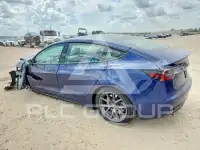2023 Tesla Model 3 фото