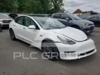 2023 Tesla Model 3 фото