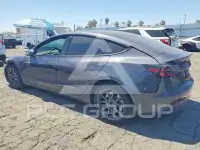 2023 Tesla Model 3 фото