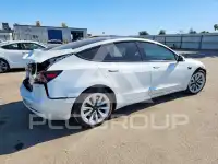 2023 Tesla Model 3 фото