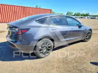 2023 Tesla Model 3 фото