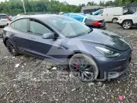 2023 Tesla Model 3 фото