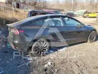 2023 Tesla Model 3 фото