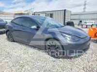 2023 Tesla Model 3 фото