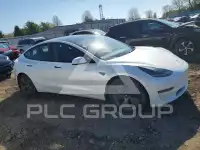 2023 Tesla Model 3 фото