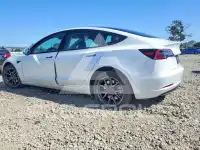 2023 Tesla Model 3 фото