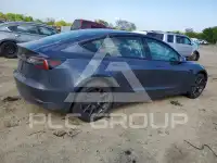 2023 Tesla Model 3 фото