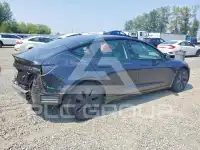 2024 Tesla Model 3 фото