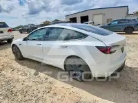 2025 Tesla Model 3 фото