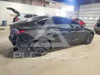 2025 Tesla Model 3 фото