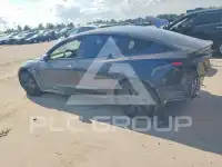 2025 Tesla Model 3 фото