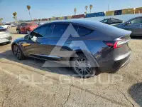 2025 Tesla Model 3 фото