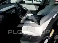 2025 Tesla Model 3 фото