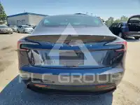 2025 Tesla Model 3 фото