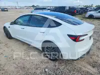 2025 Tesla Model 3 фото