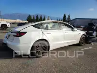 2025 Tesla Model 3 фото