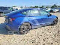 2025 Tesla Model 3 фото