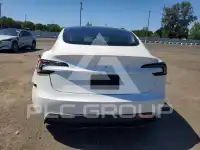 2025 Tesla Model 3 фото