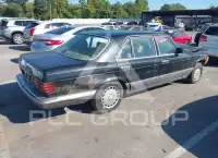 1990 Mercedes Benz 560 фото