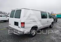 2002 Ford E-150 фото