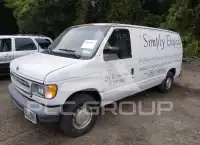 2002 Ford E-150 фото