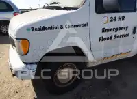 2002 Ford E-150 фото