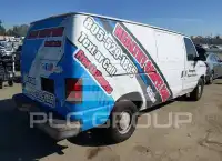 2002 Ford E-150 фото