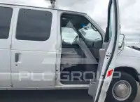 2002 Ford E-250 фото
