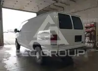2004 Ford E-250 фото