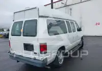 2010 Ford E-150 фото