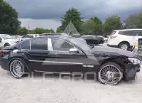 2013 BMW 750 фото