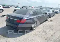 2013 BMW 750 фото