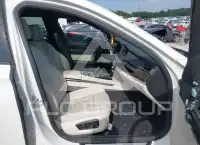 2013 BMW 740 фото